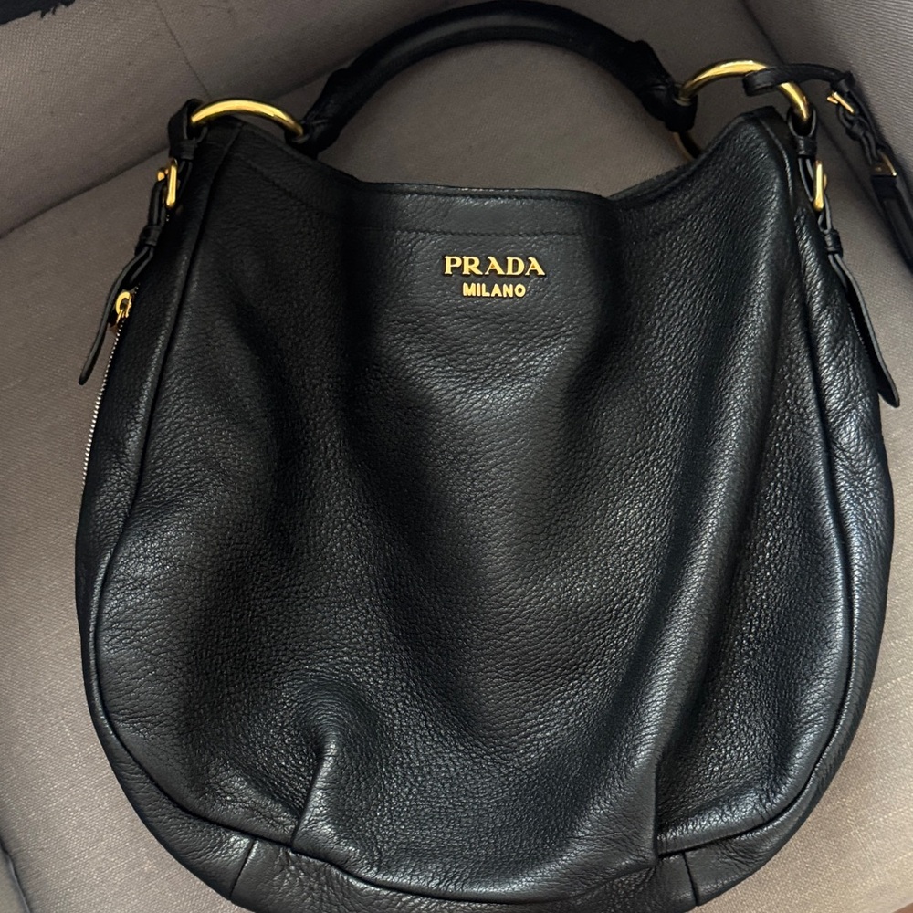 Prada Black Leather Hobo Bag with Gold Accents